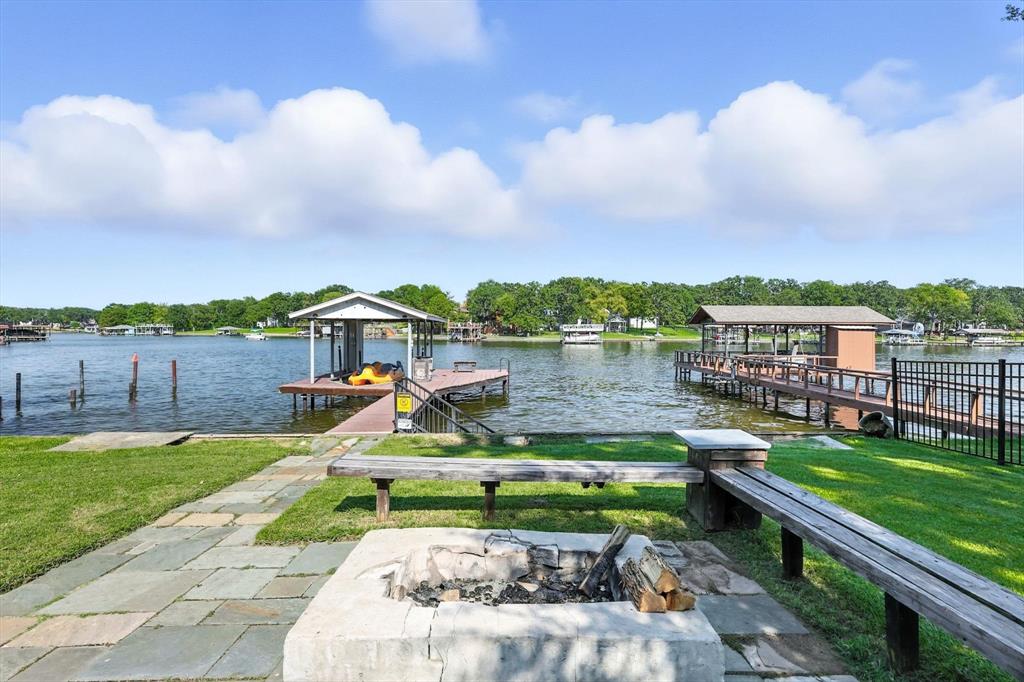 150 Red Bluff Loop Mabank, TX 75156 - Photo 8 of 26 a view of a lake with a garden