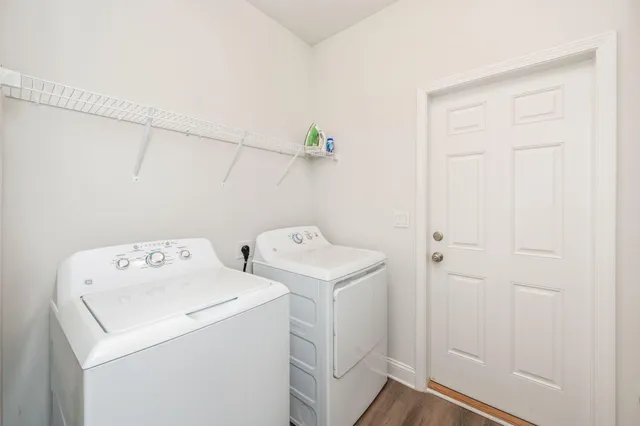 a utility room with dryer and washer