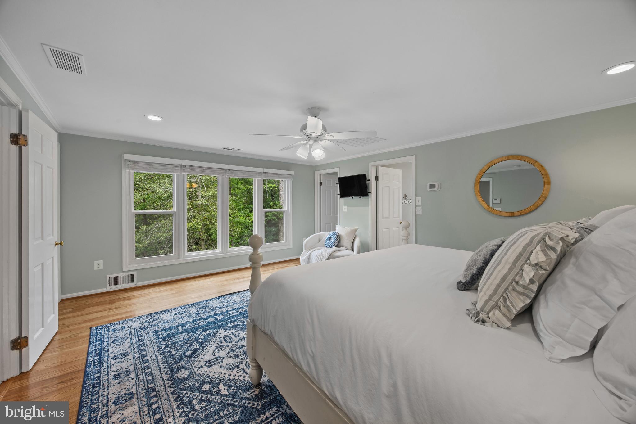 3484 Olympia Road Davidsonville, MD 21035 - Photo 26 of 50 a bedroom with a large bed and a large window