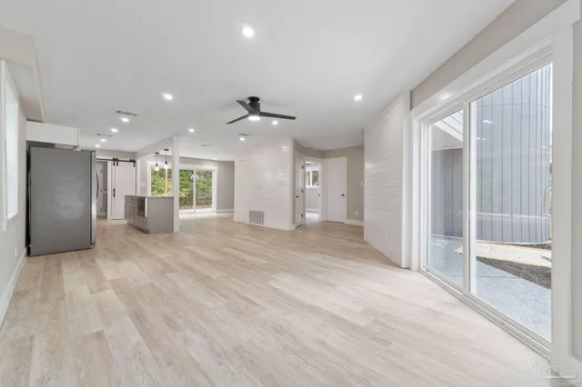 a view of a empty room with a cabinet