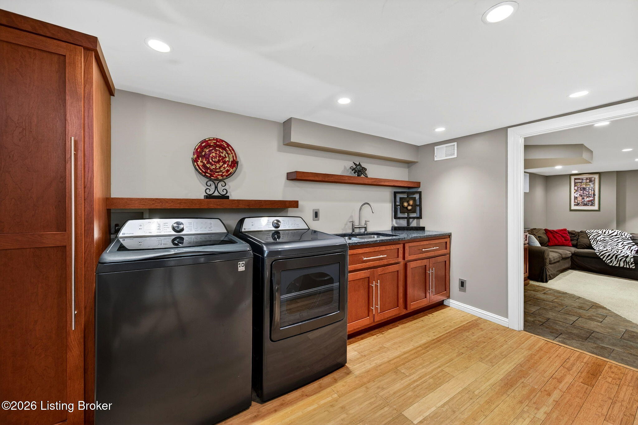3101 Bobolink Road Louisville, KY 40213 - Photo 36 of 57 The laundry room highlights bamboo flooring