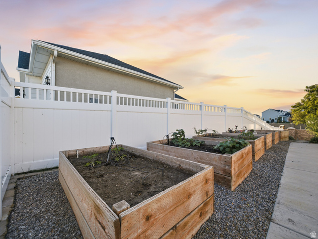 7 Sterling Loop Vineyard, UT 84059 - Photo 6 of 43 Multiple raised garden beds featuring wood construction and integrated irrigation