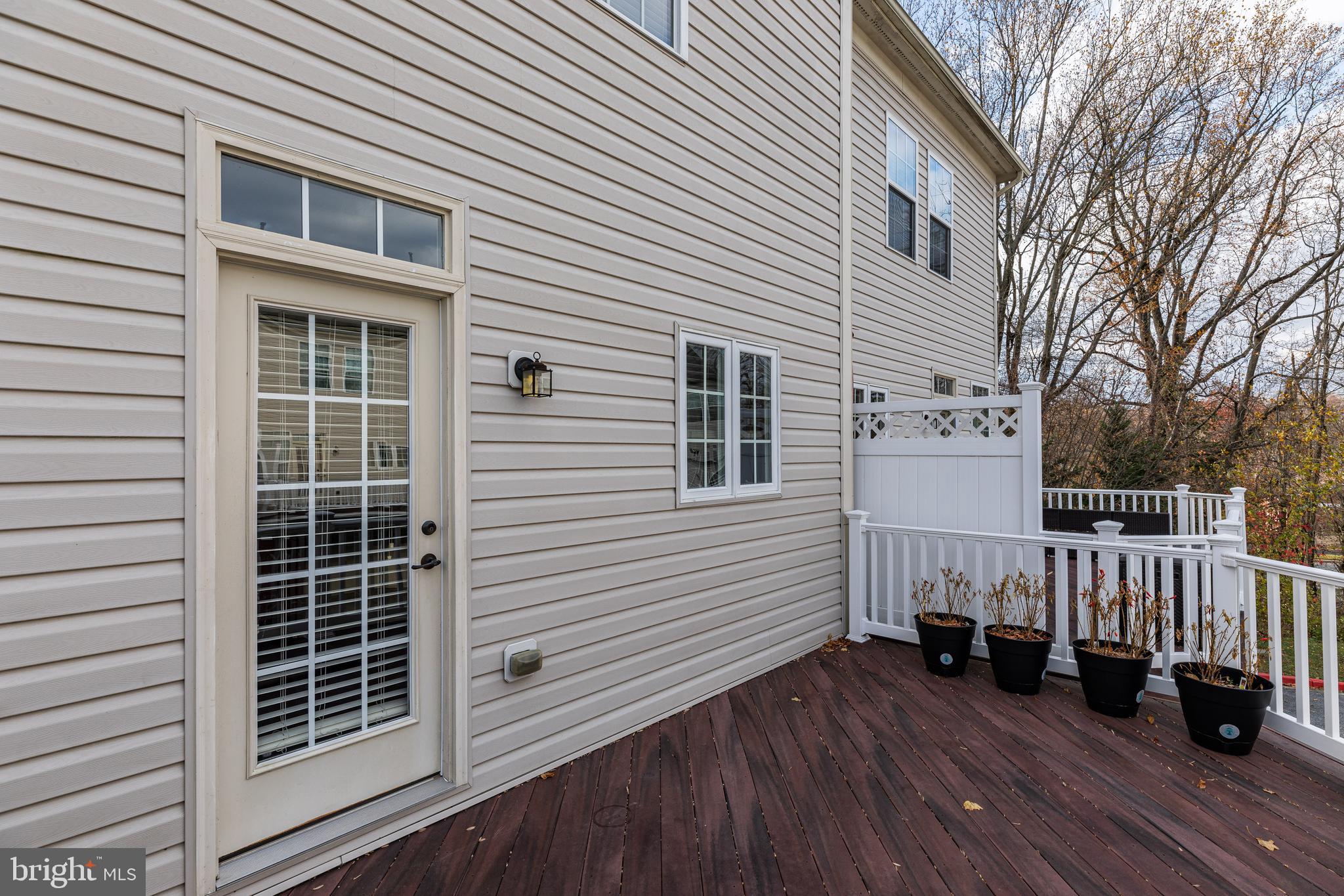 9605 Torino Road, Unit 72 Ellicott City, MD 21042 - Photo 35 of 40 Back Deck off of the Kitchen