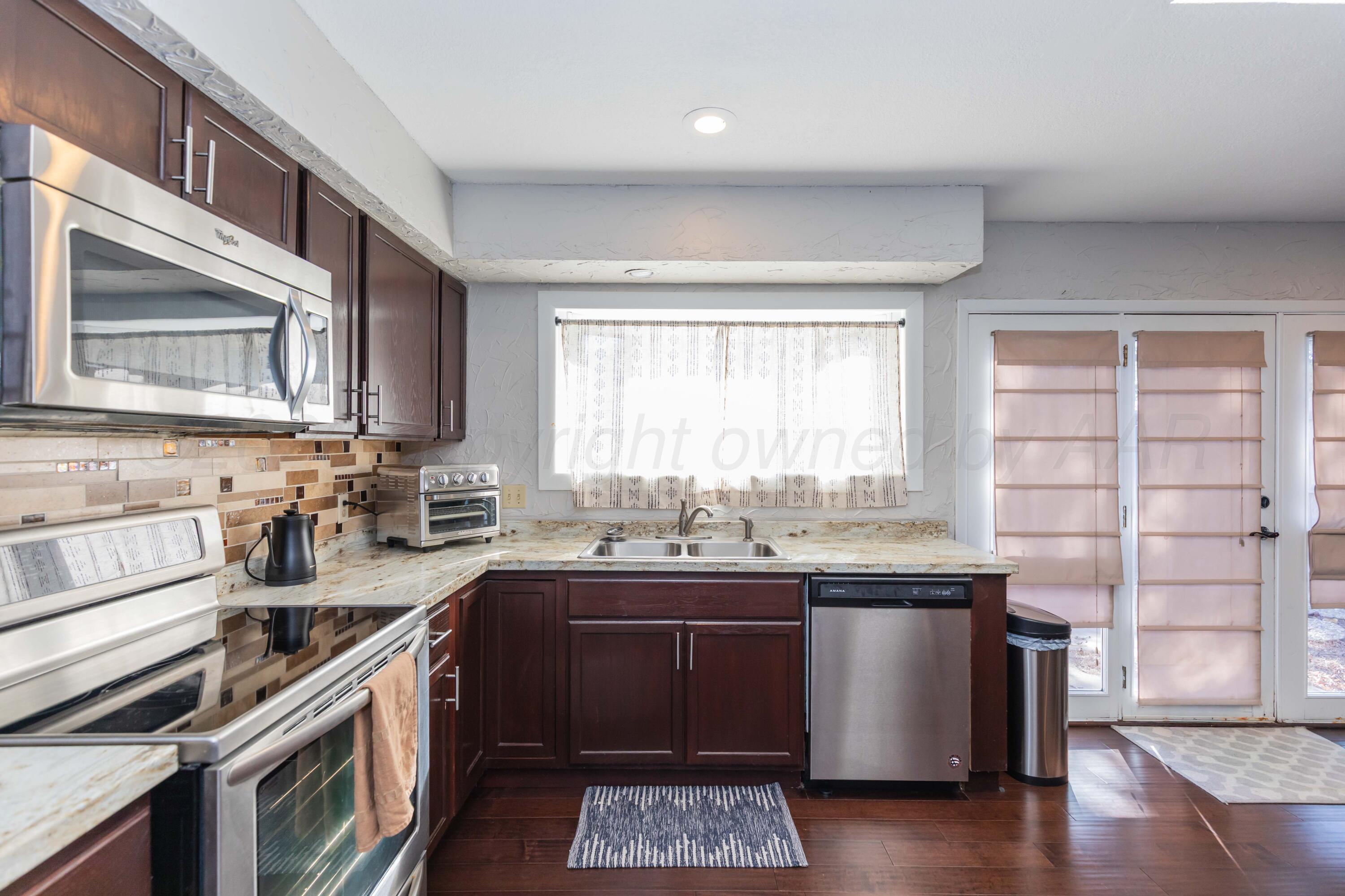 1501 Bailey Avenue Dumas, TX 79029 - Photo 12 of 37 KITCHEN VIEW 1