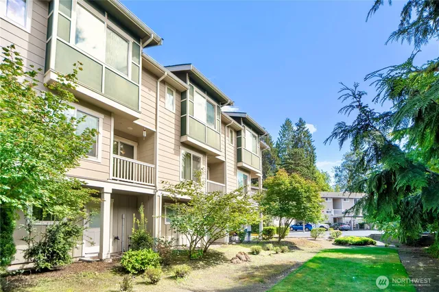 a view of a building with a yard