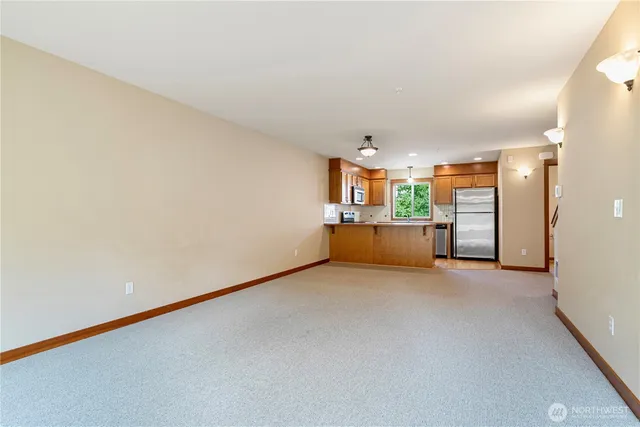 a view of a kitchen with a sink