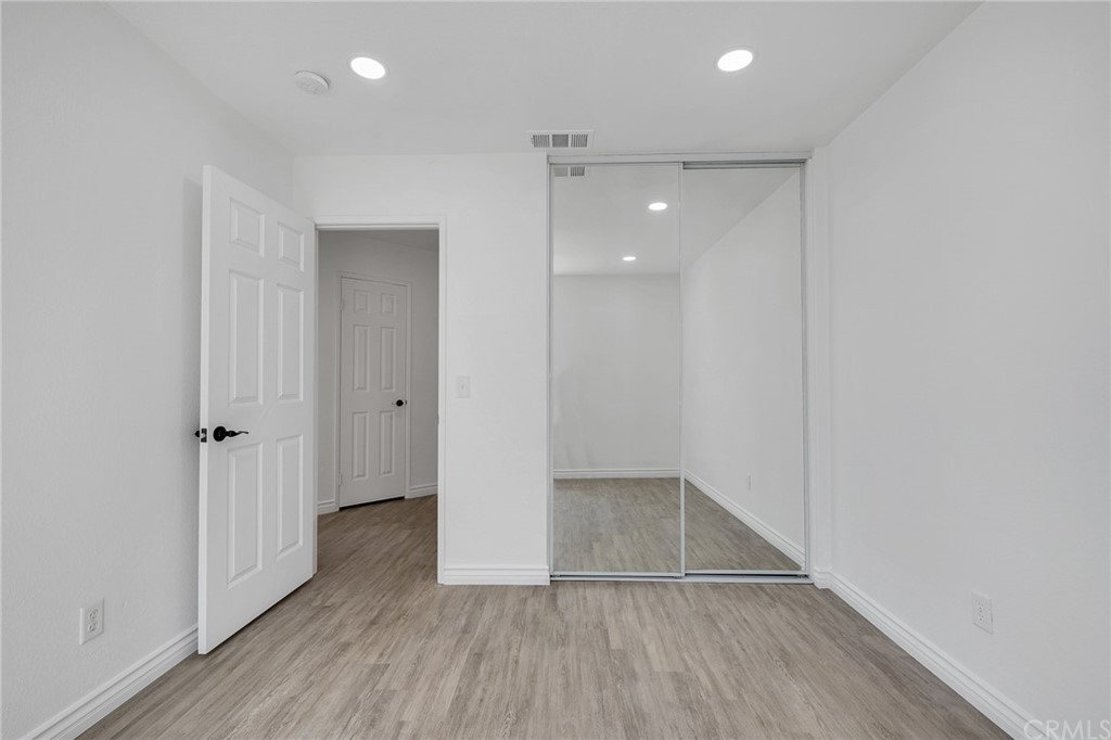 175 Paperbirch Circle Corona, CA 92881 - Photo 24 of 33 a view of hallway with wooden floor