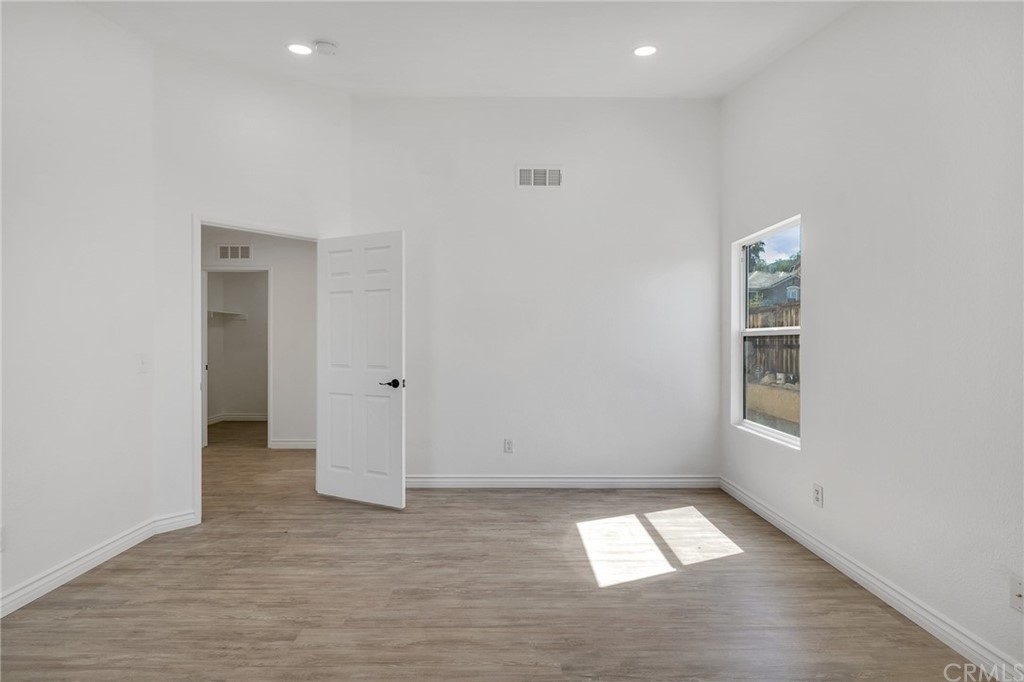 175 Paperbirch Circle Corona, CA 92881 - Photo 25 of 33 an empty room with windows