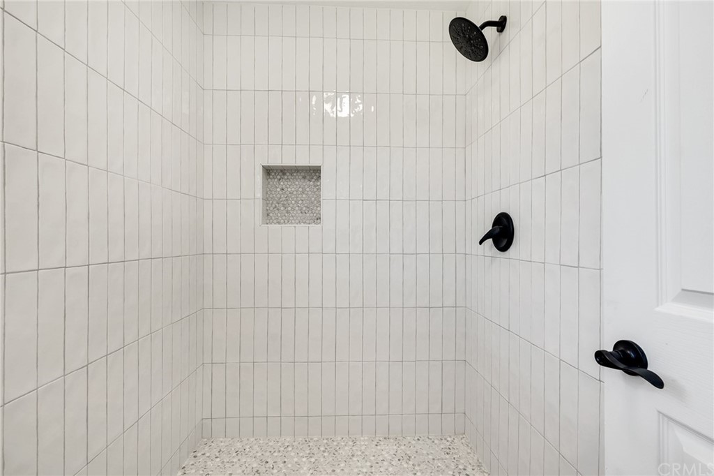 175 Paperbirch Circle Corona, CA 92881 - Photo 27 of 33 a bathroom with a shower