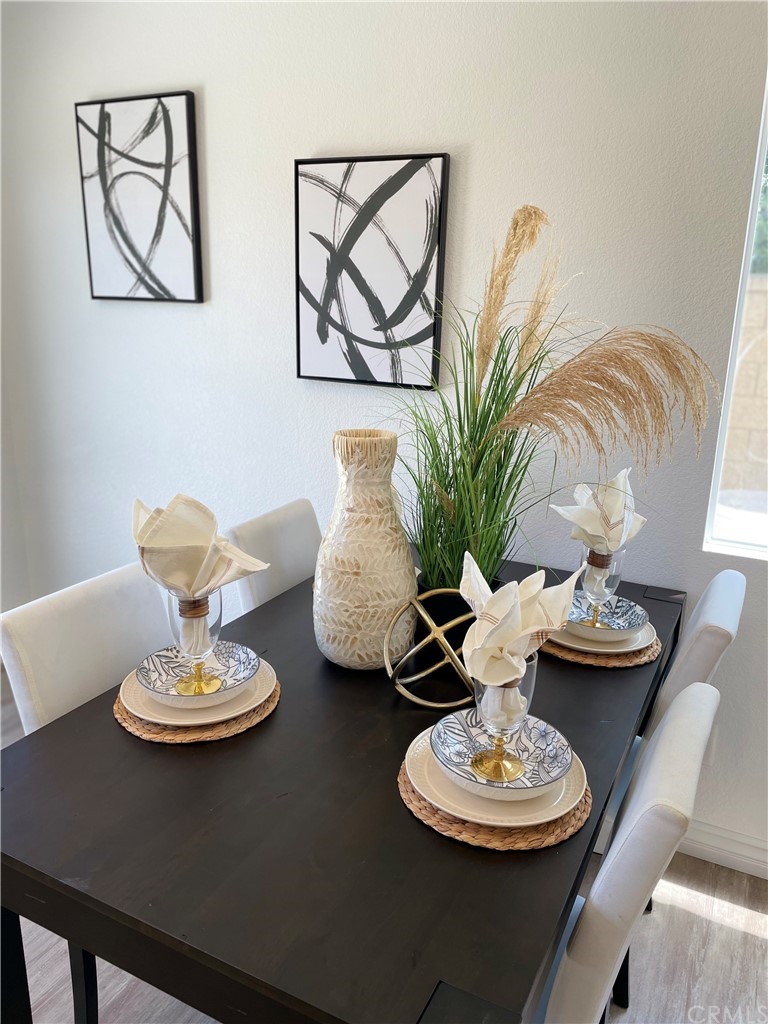 175 Paperbirch Circle Corona, CA 92881 - Photo 6 of 33 a living room with furniture and a table