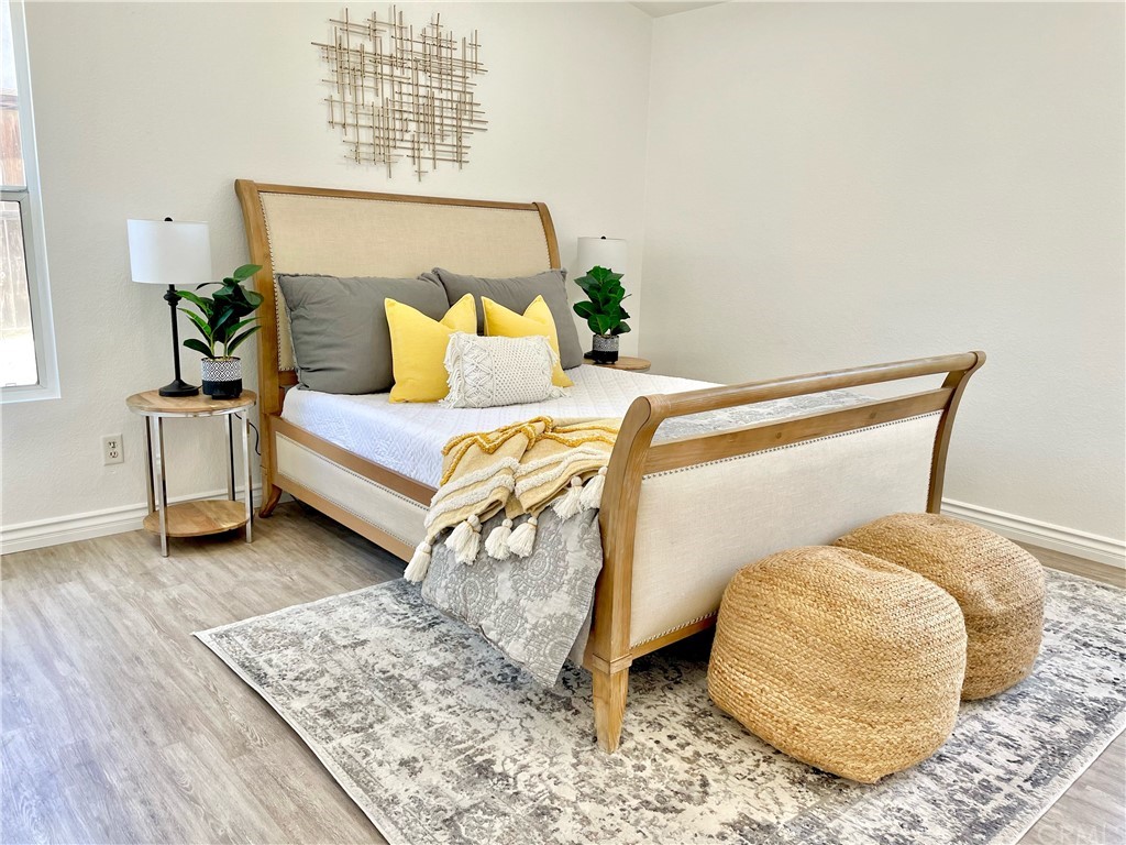 175 Paperbirch Circle Corona, CA 92881 - Photo 7 of 33 a bedroom with a bed and a window