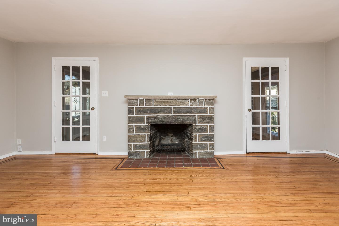 136 Shelbourne Road Havertown, PA 19083 - Photo 14 of 48 a view of a livingroom with a fireplace