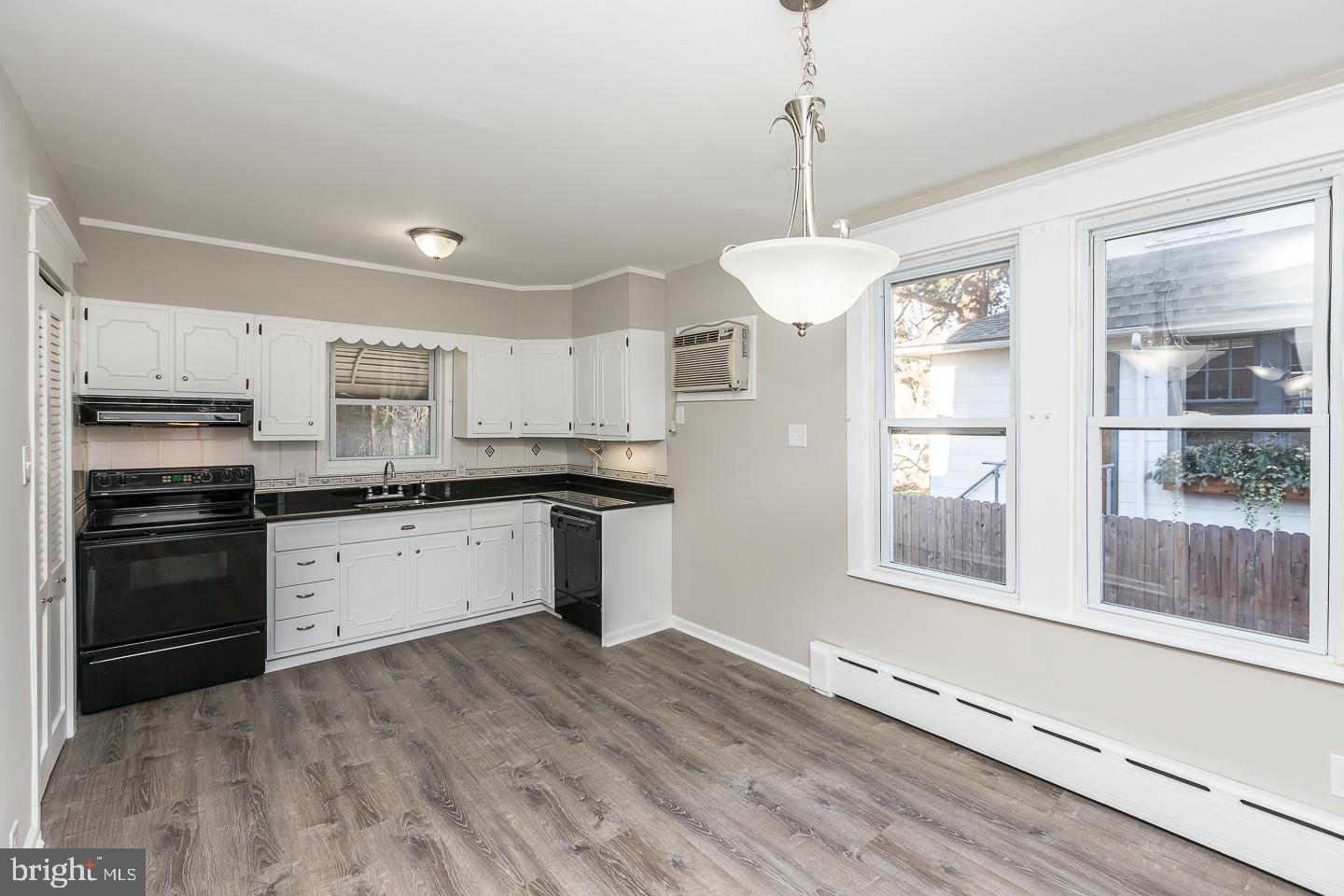 136 Shelbourne Road Havertown, PA 19083 - Photo 21 of 48 a kitchen with stainless steel appliances granite countertop a stove sink and refrigerator