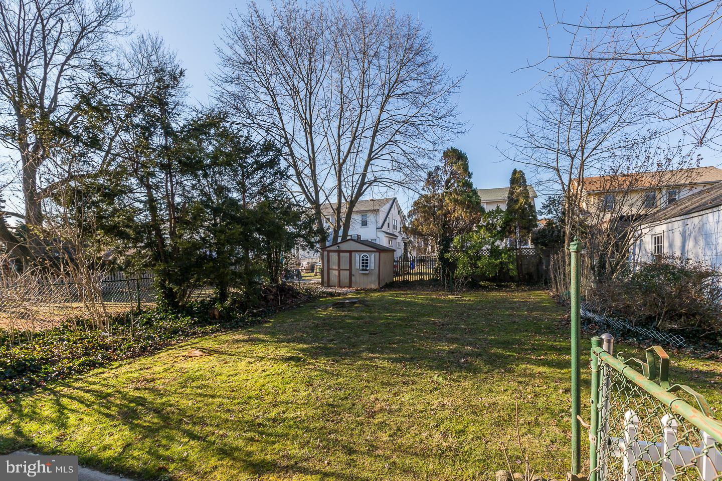 136 Shelbourne Road Havertown, PA 19083 - Photo 6 of 48 a backyard of a house with lots of green space and fountain
