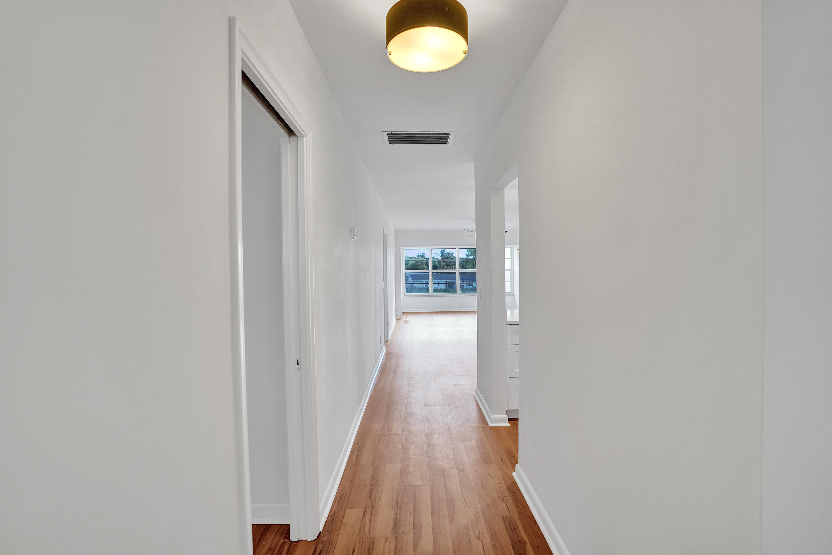 1130 Mahogany Way, Unit 203 Delray Beach, FL 33445 - Photo 12 of 34 wooden floor in a gallery