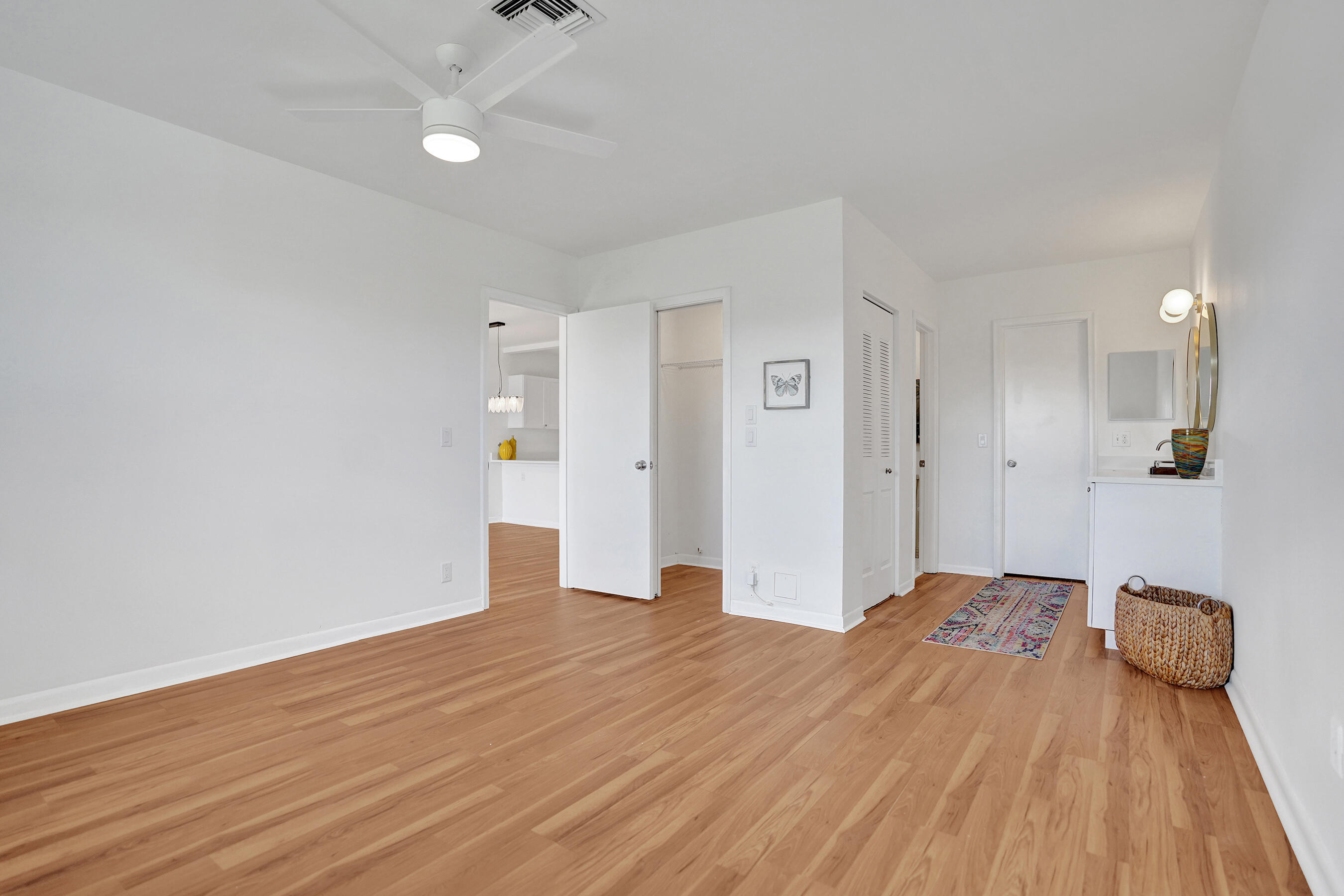 1130 Mahogany Way, Unit 203 Delray Beach, FL 33445 - Photo 16 of 34 a view of a livingroom with wooden floor