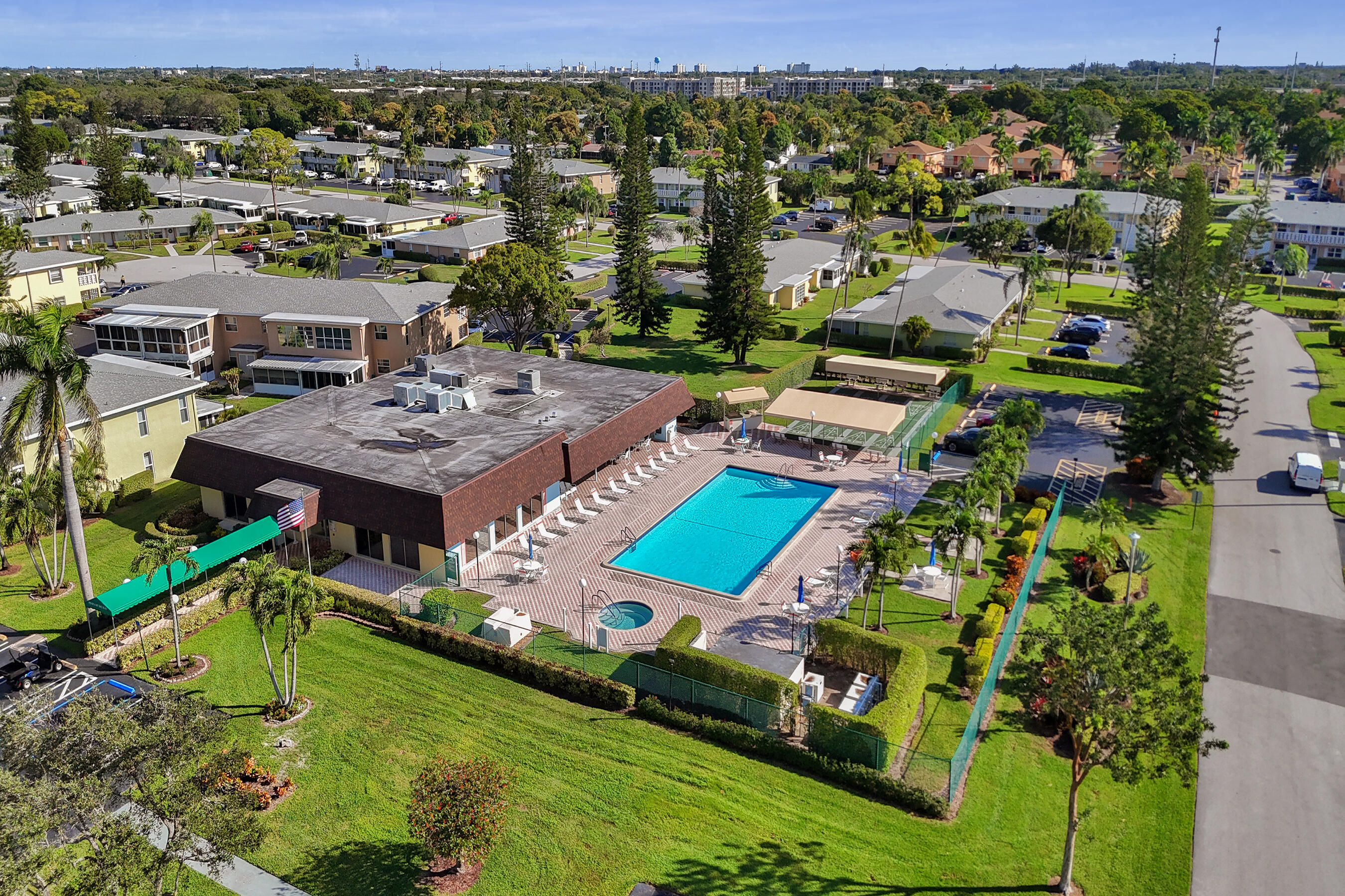 1130 Mahogany Way, Unit 203 Delray Beach, FL 33445 - Photo 30 of 34 an aerial view of a house with a big yard