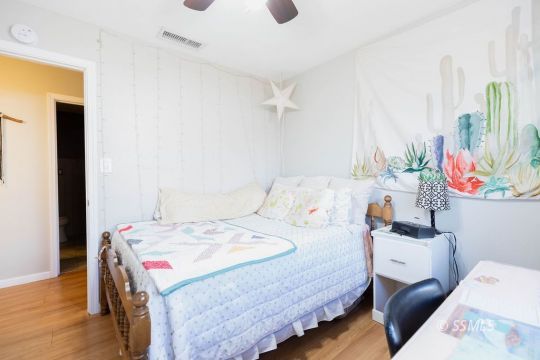 632 South Gordon Street Ridgecrest, CA 93555 - Photo 21 of 30 a bedroom with a bed and a dresser