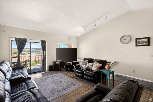 161 West 950 South, Unit Q1 St. George, UT 84770 - Photo 11 of 37 Living area featuring track lighting and wood finished floors