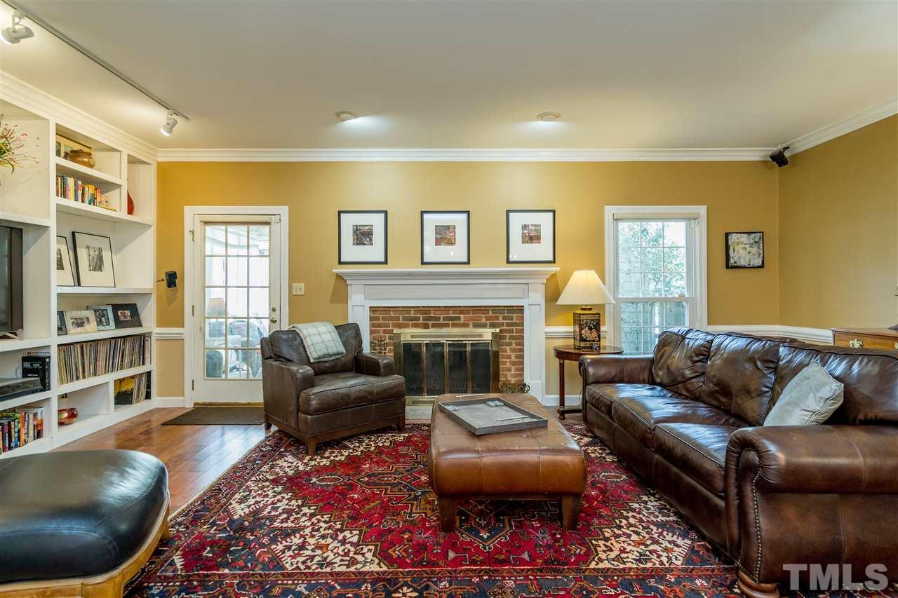 717 Weathergreen Drive Raleigh, NC 27615 - Photo 3 of 30 Beautiful flooring, open flow, wood burning fireplace!