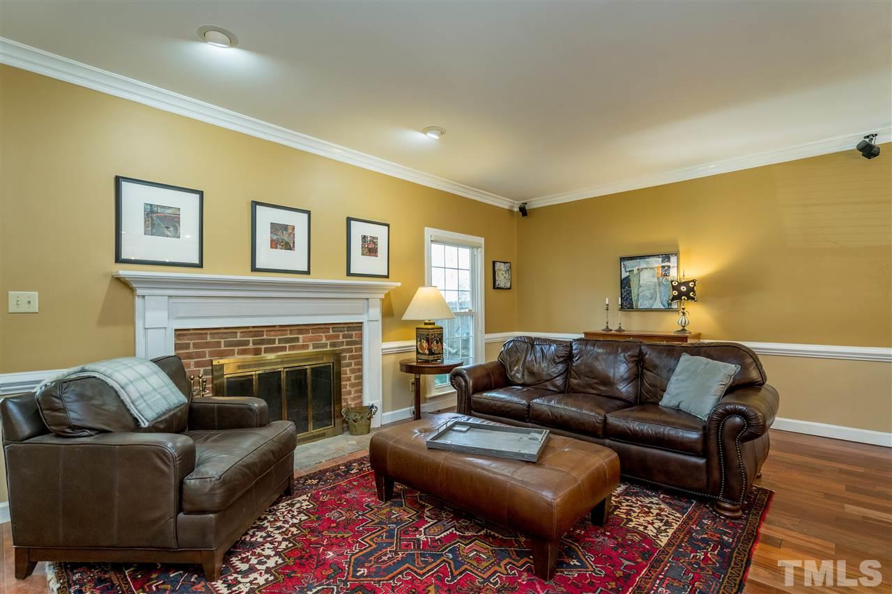 717 Weathergreen Drive Raleigh, NC 27615 - Photo 4 of 30 Gorgeous Details include Patagonia Rosewood hardwoods, crown molding and chair rail molding.
