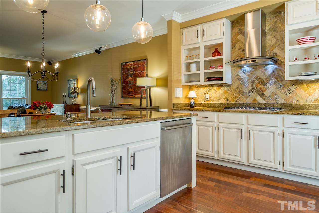 717 Weathergreen Drive Raleigh, NC 27615 - Photo 7 of 30 Plenty of space to cook and to be with friends. Feels like new!