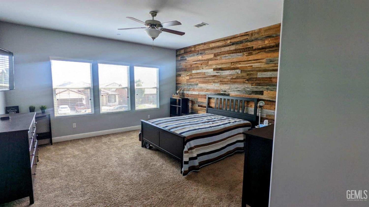 Undisclosed Address Shafter, CA 93263 - Photo 12 of 31 a bedroom with a bed and window