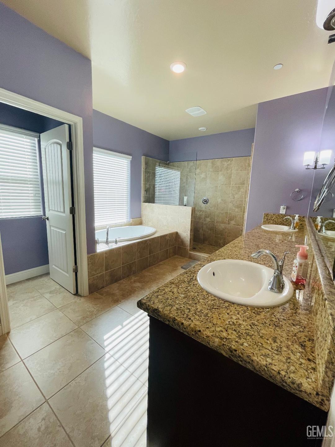 Undisclosed Address Shafter, CA 93263 - Photo 14 of 31 a bathroom with a granite countertop sink and a mirror