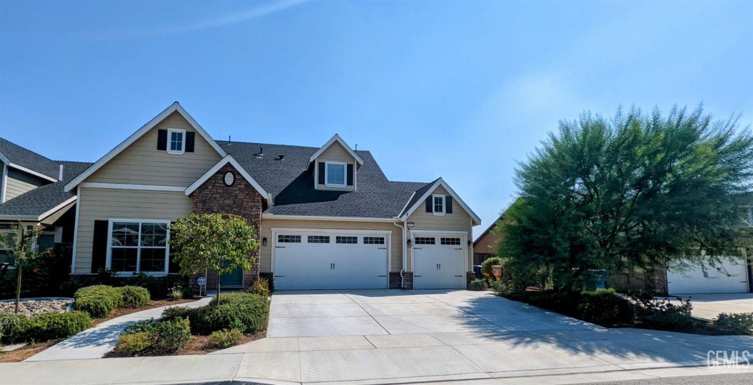 Undisclosed Address Shafter, CA 93263 - Photo 2 of 31 a front view of a house with a yard