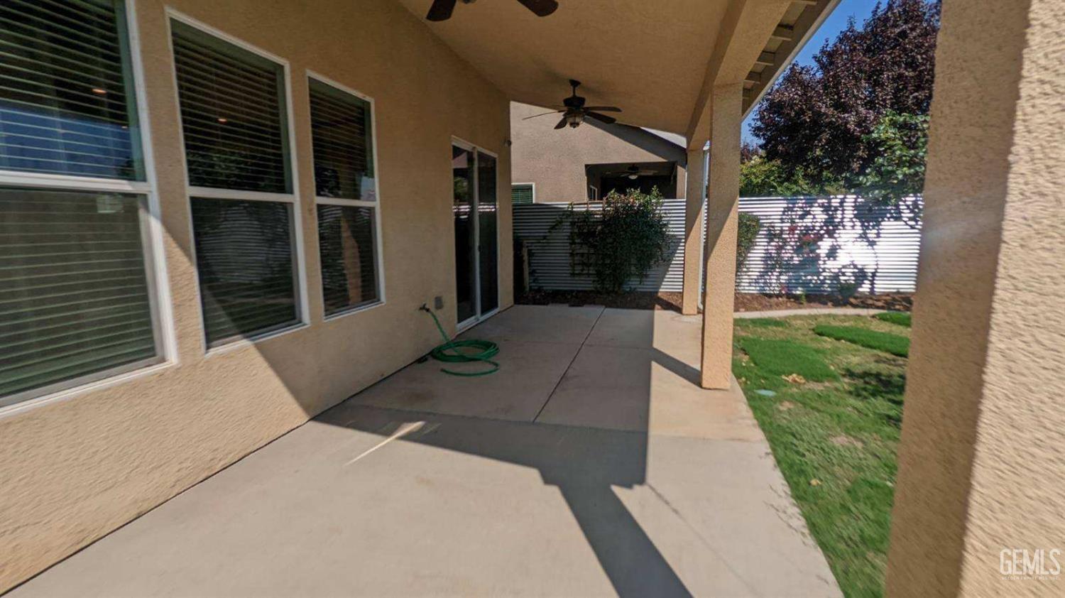 Undisclosed Address Shafter, CA 93263 - Photo 28 of 31 a front view of a house with a porch