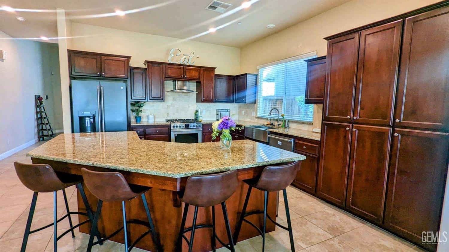 Undisclosed Address Shafter, CA 93263 - Photo 5 of 31 a view of a dining room with furniture