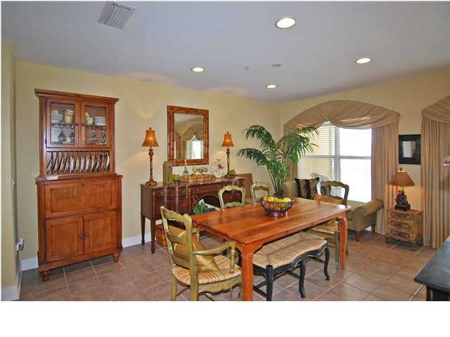 B302 Seacrest Blvd Inlet Beach, Unit B302 Inlet Beach, FL 32461 - Photo 13 of 19 a dining room with furniture and window