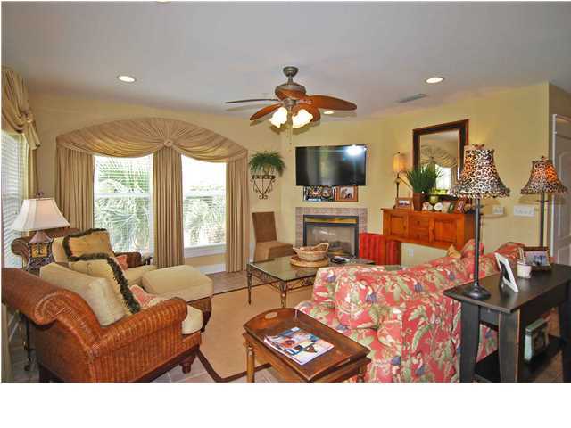 B302 Seacrest Blvd Inlet Beach, Unit B302 Inlet Beach, FL 32461 - Photo 14 of 19 a living room with fireplace furniture and a flat screen tv