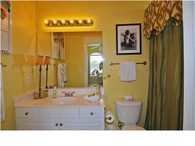 B302 Seacrest Blvd Inlet Beach, Unit B302 Inlet Beach, FL 32461 - Photo 4 of 19 a bathroom with a sink and a mirror
