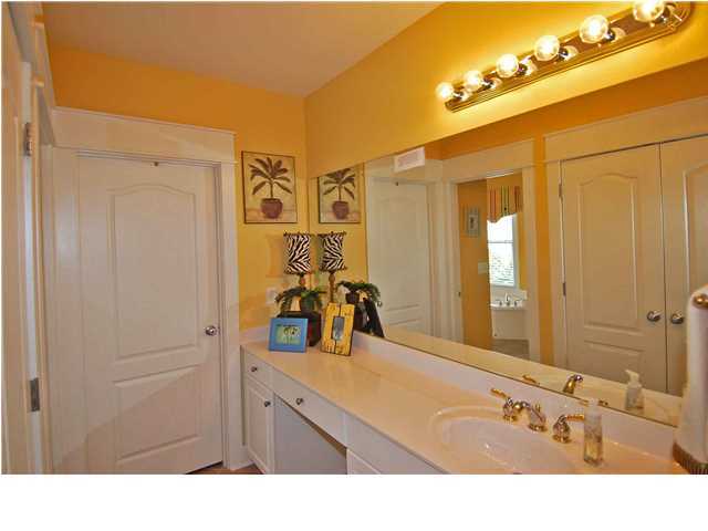 B302 Seacrest Blvd Inlet Beach, Unit B302 Inlet Beach, FL 32461 - Photo 8 of 19 a bathroom with a sink and a mirror