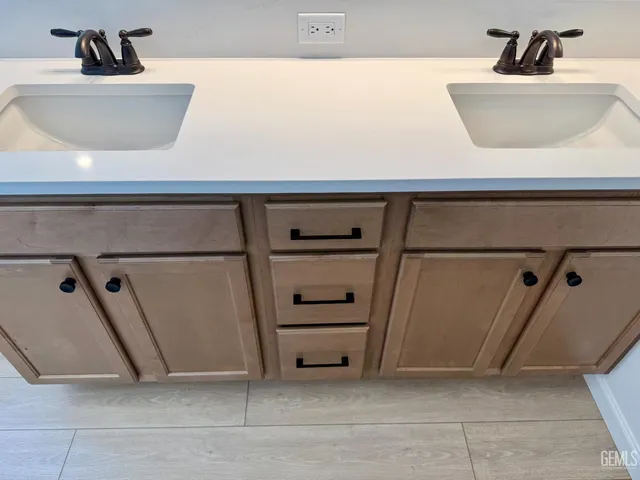 a bathroom with a shower and a bath tub