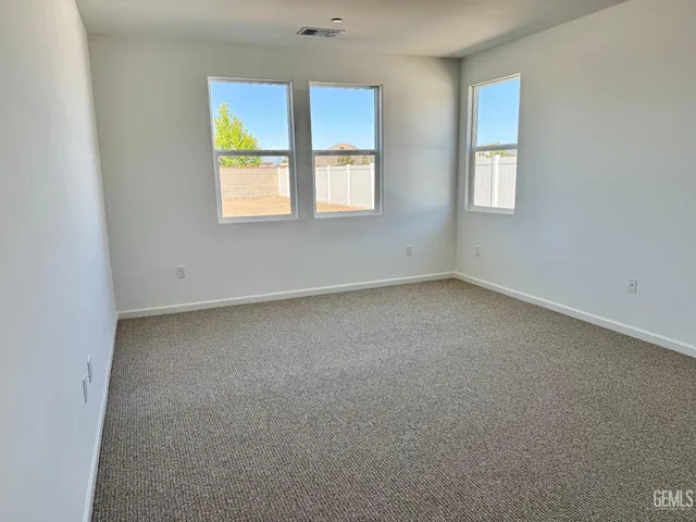 a view of swimming pool with an outdoor seating