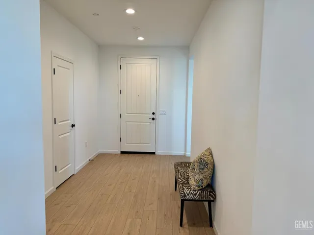 a view of a street with a building in the background