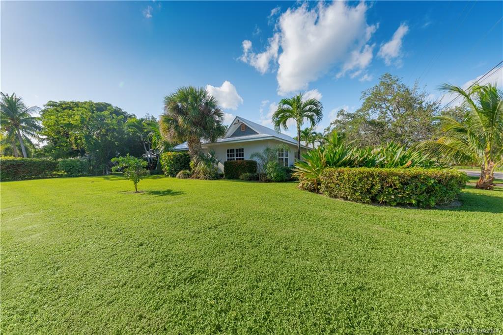 85 South Sewalls Point Road Sewall's Point, FL 34996 - Photo 28 of 34 a front view of a house with garden