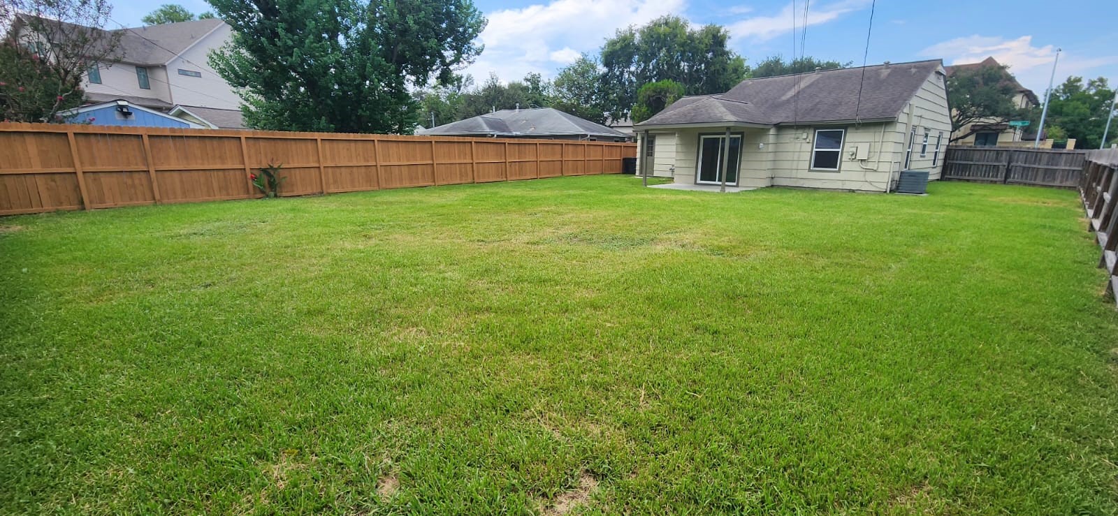 5501 Huisache Street Houston, TX 77081 - Photo 11 of 15 a view of a yard in front of a house