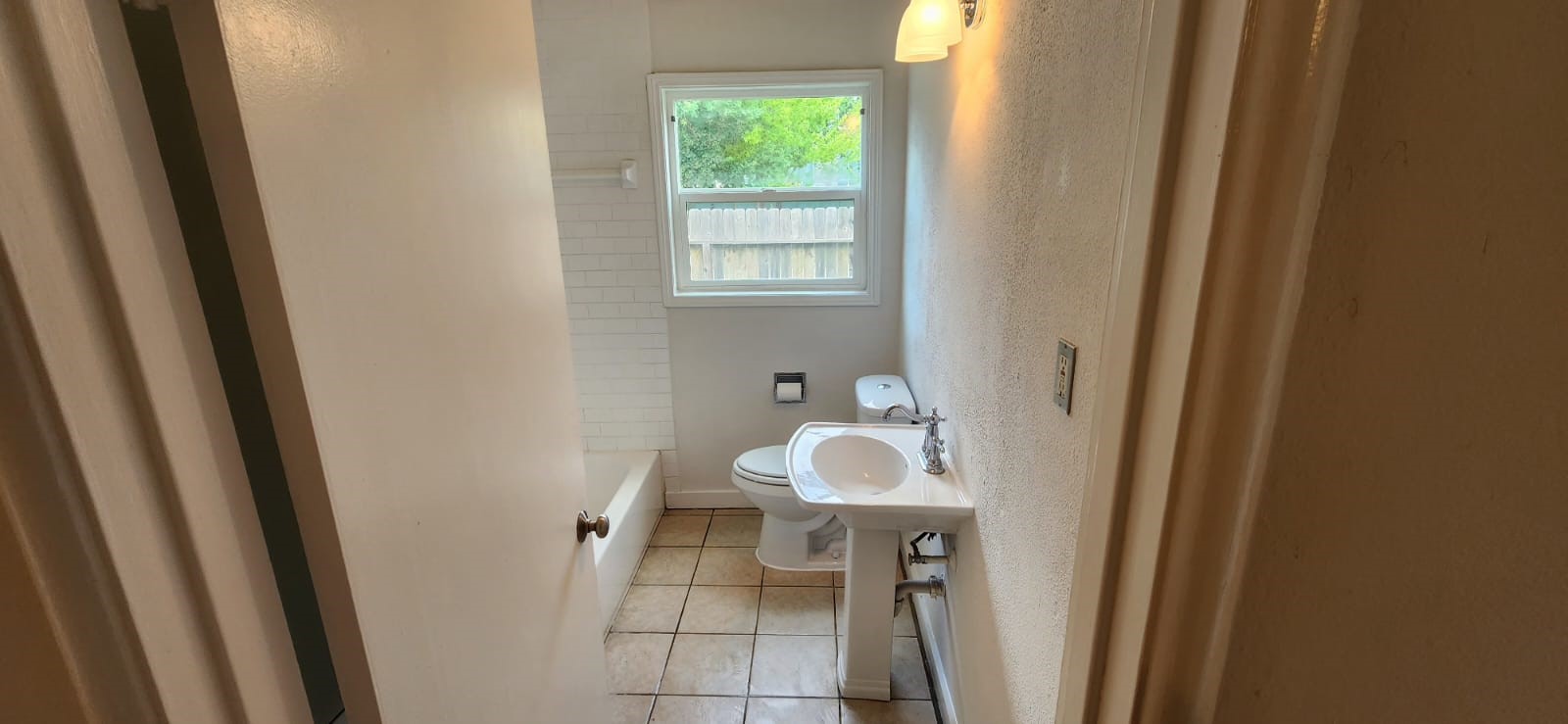 5501 Huisache Street Houston, TX 77081 - Photo 7 of 15 a bathroom with a sink and a mirror