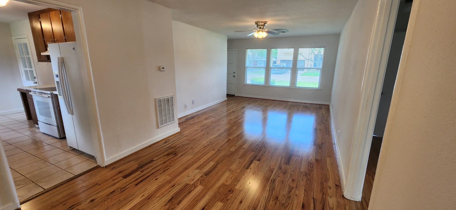 5501 Huisache Street Houston, TX 77081 - Photo 10 of 15 a view of entryway with wooden floor