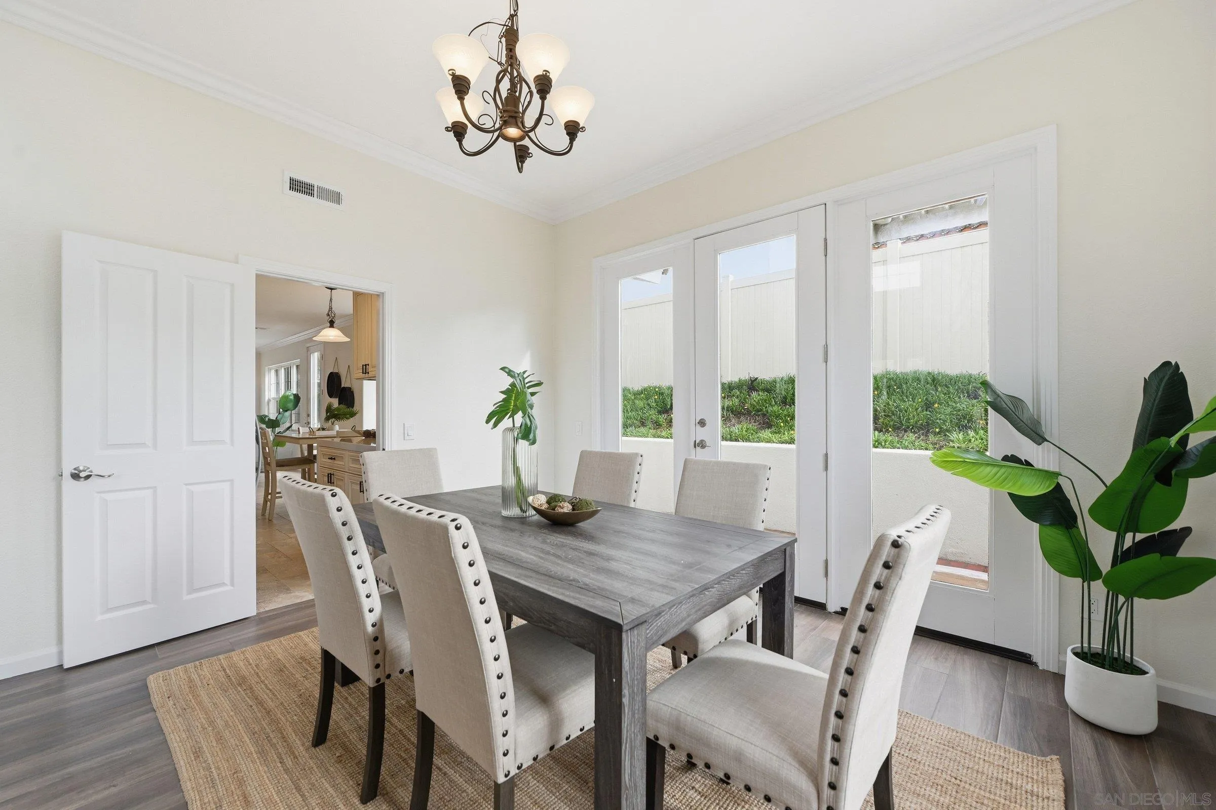 12632 Footman Lane Poway, CA 92064 - Photo 14 of 48 a view of a dining room with furniture window and wooden floor