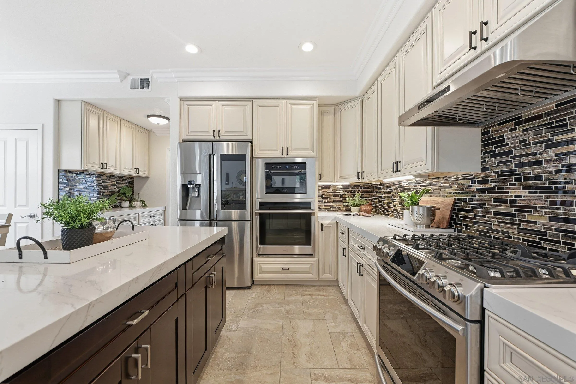 12632 Footman Lane Poway, CA 92064 - Photo 22 of 48 a kitchen with stainless steel appliances kitchen island granite countertop a sink and stove