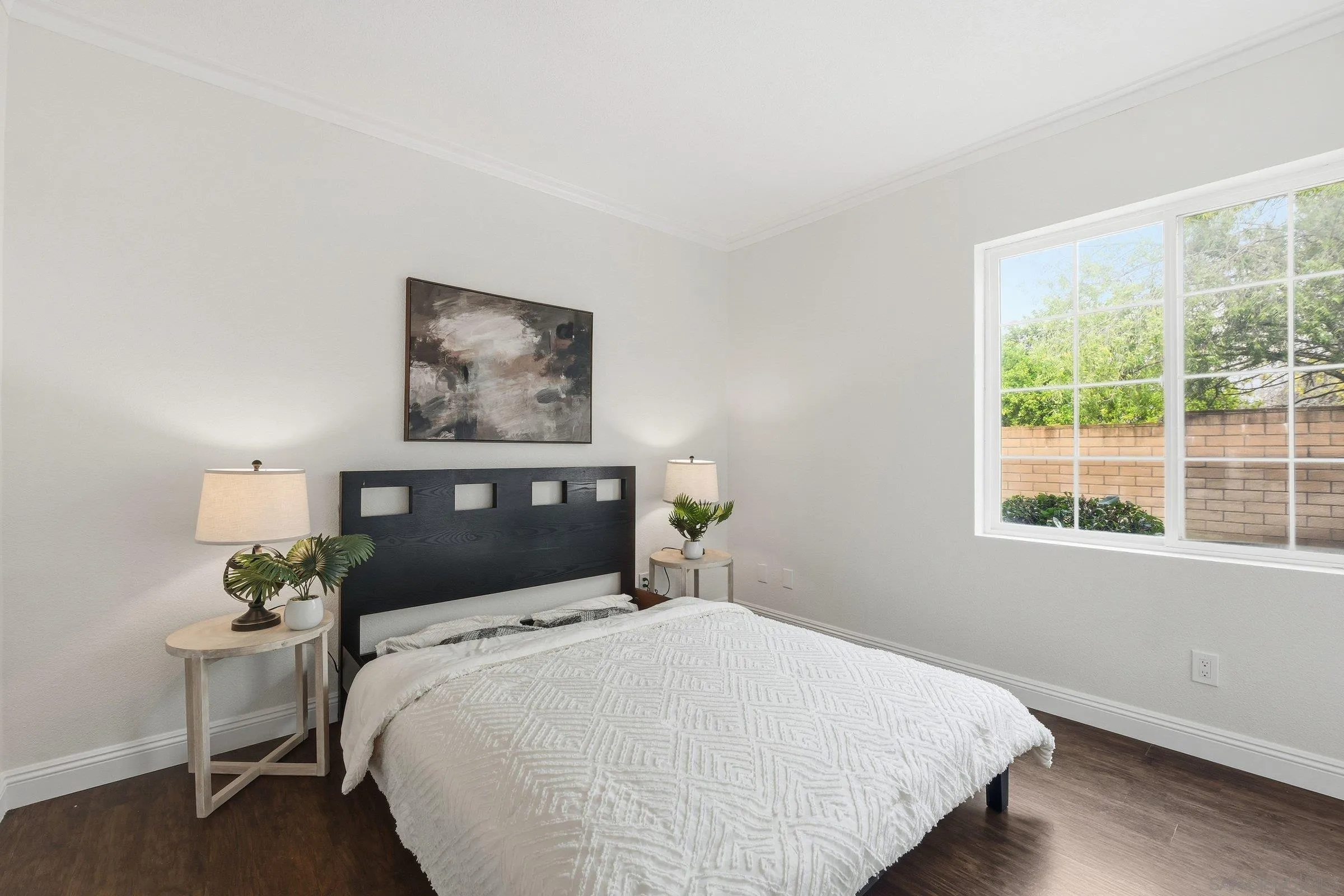 12632 Footman Lane Poway, CA 92064 - Photo 26 of 48 a bedroom with a bed table and a window