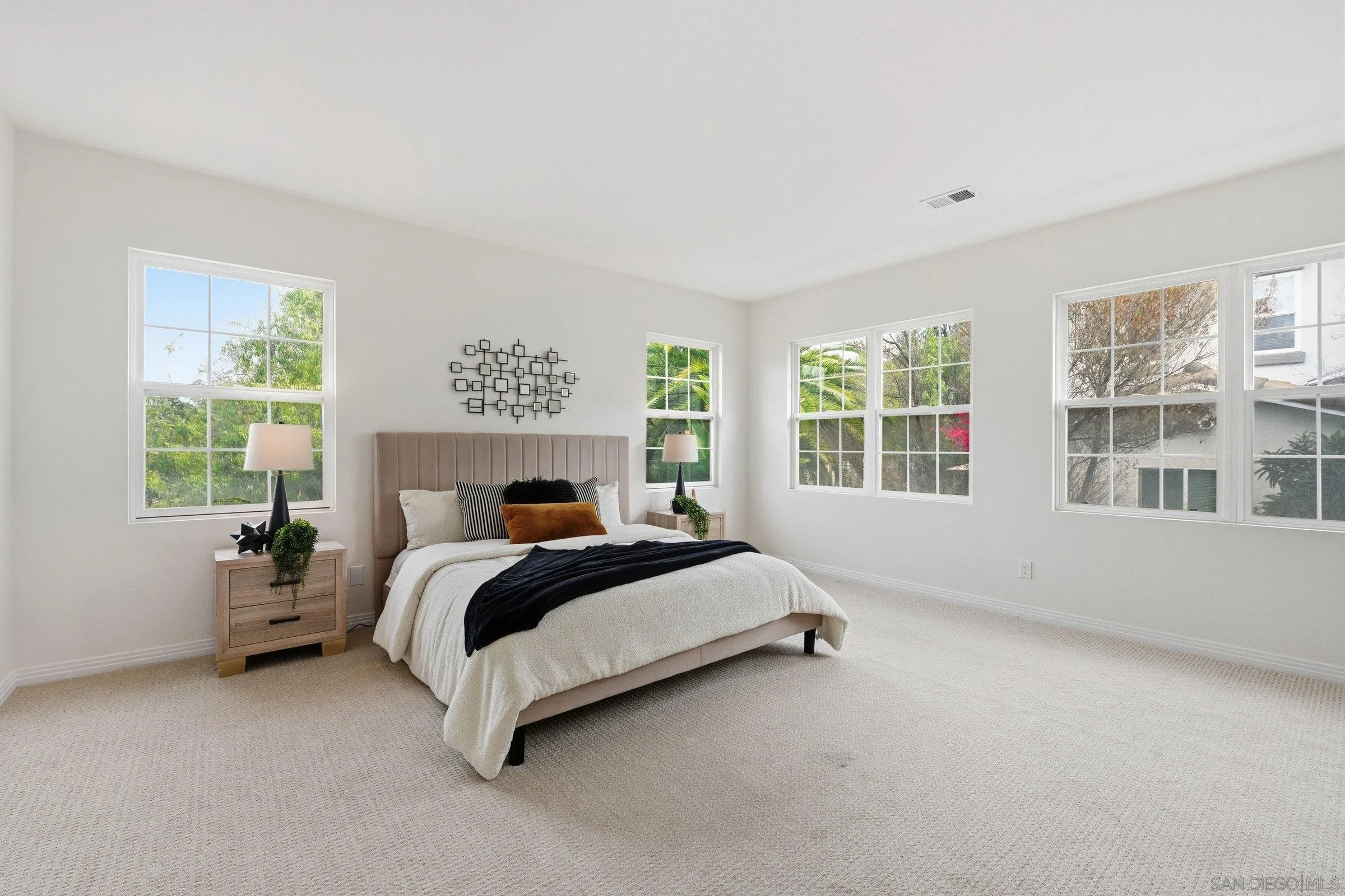 12632 Footman Lane Poway, CA 92064 - Photo 29 of 48 a bed sitting in a spacious bedroom next to a window