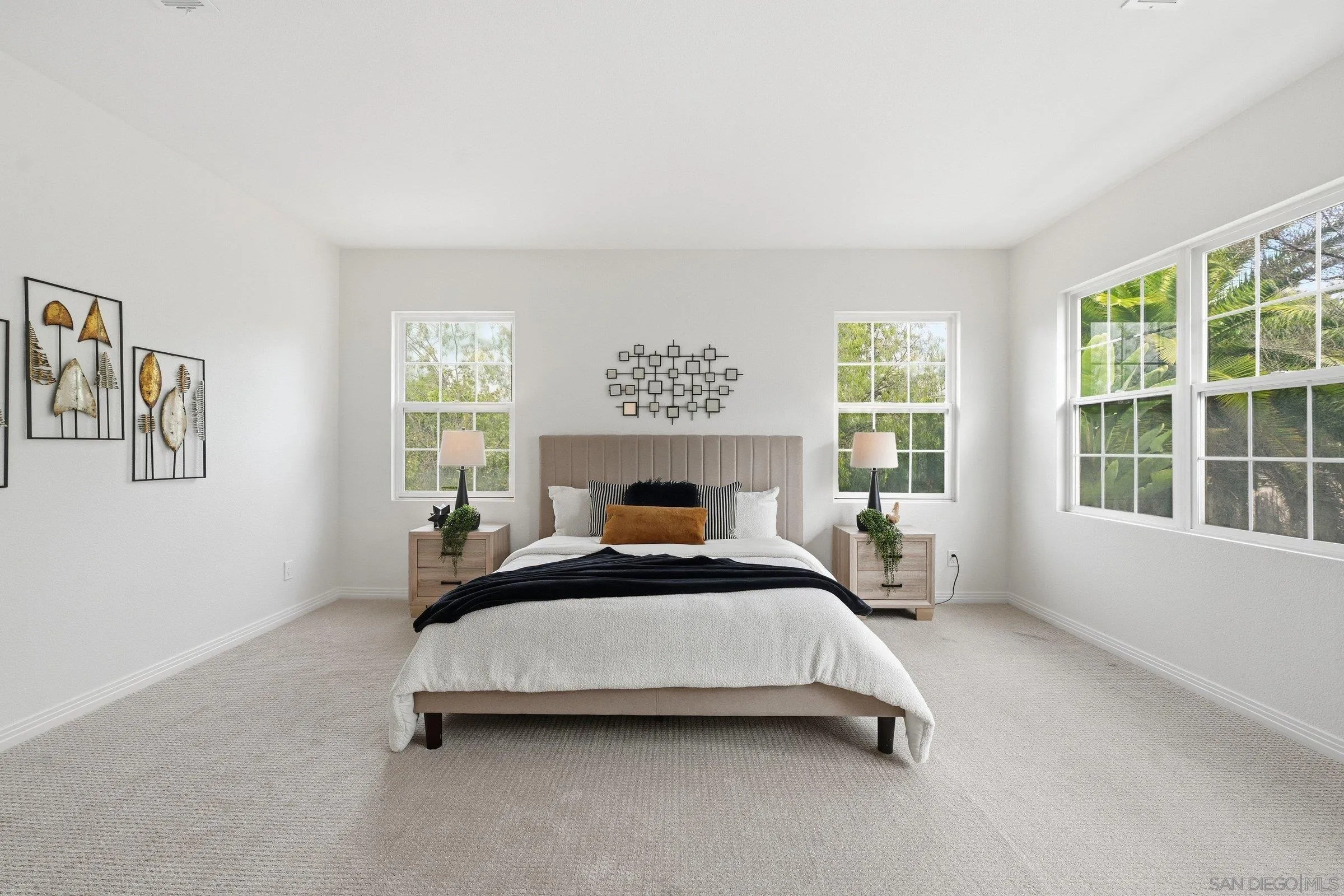 12632 Footman Lane Poway, CA 92064 - Photo 30 of 48 a bed sitting in a bedroom next to a window