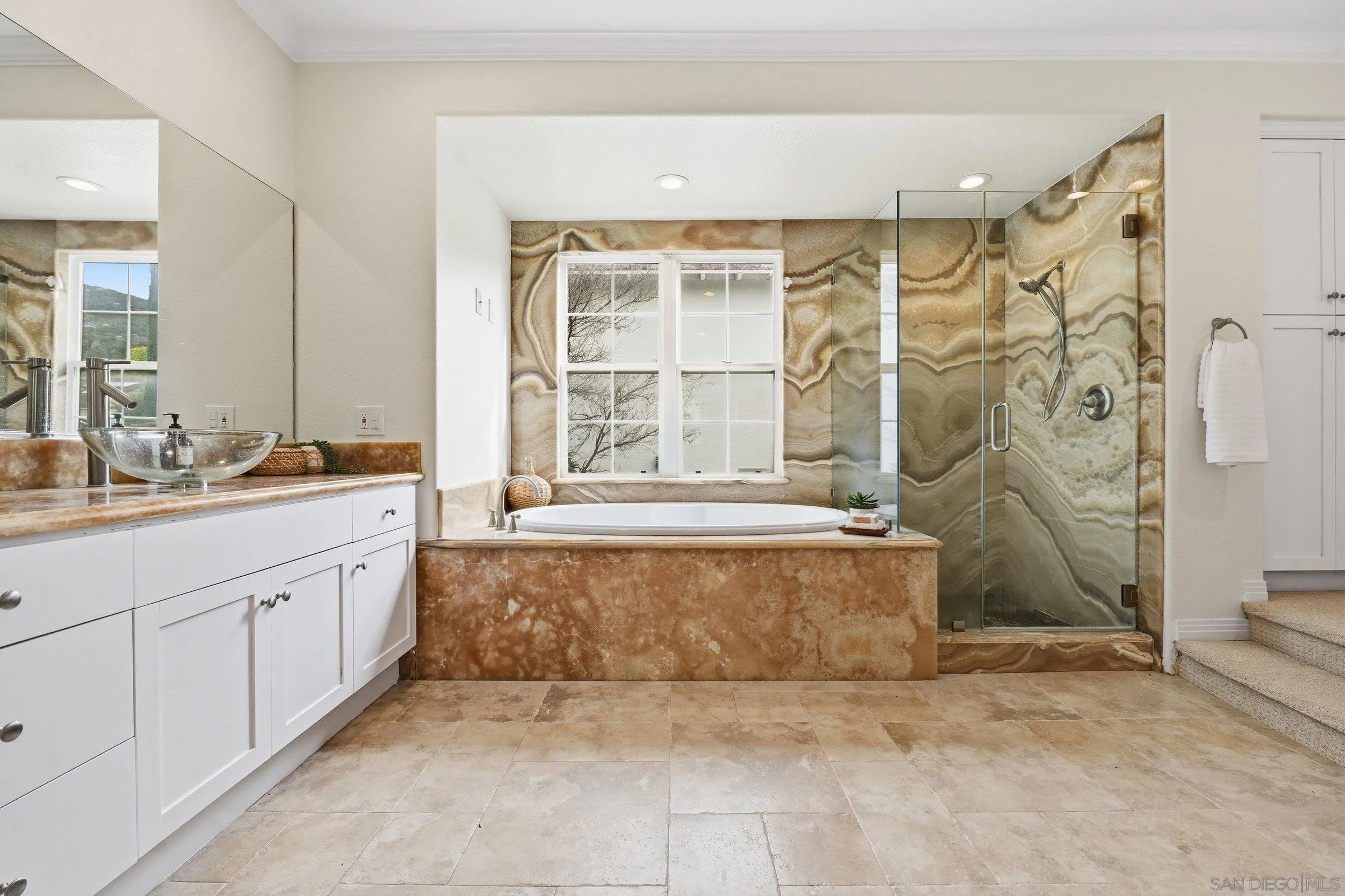 12632 Footman Lane Poway, CA 92064 - Photo 34 of 48 a spacious bathroom with a granite countertop tub sink and shower