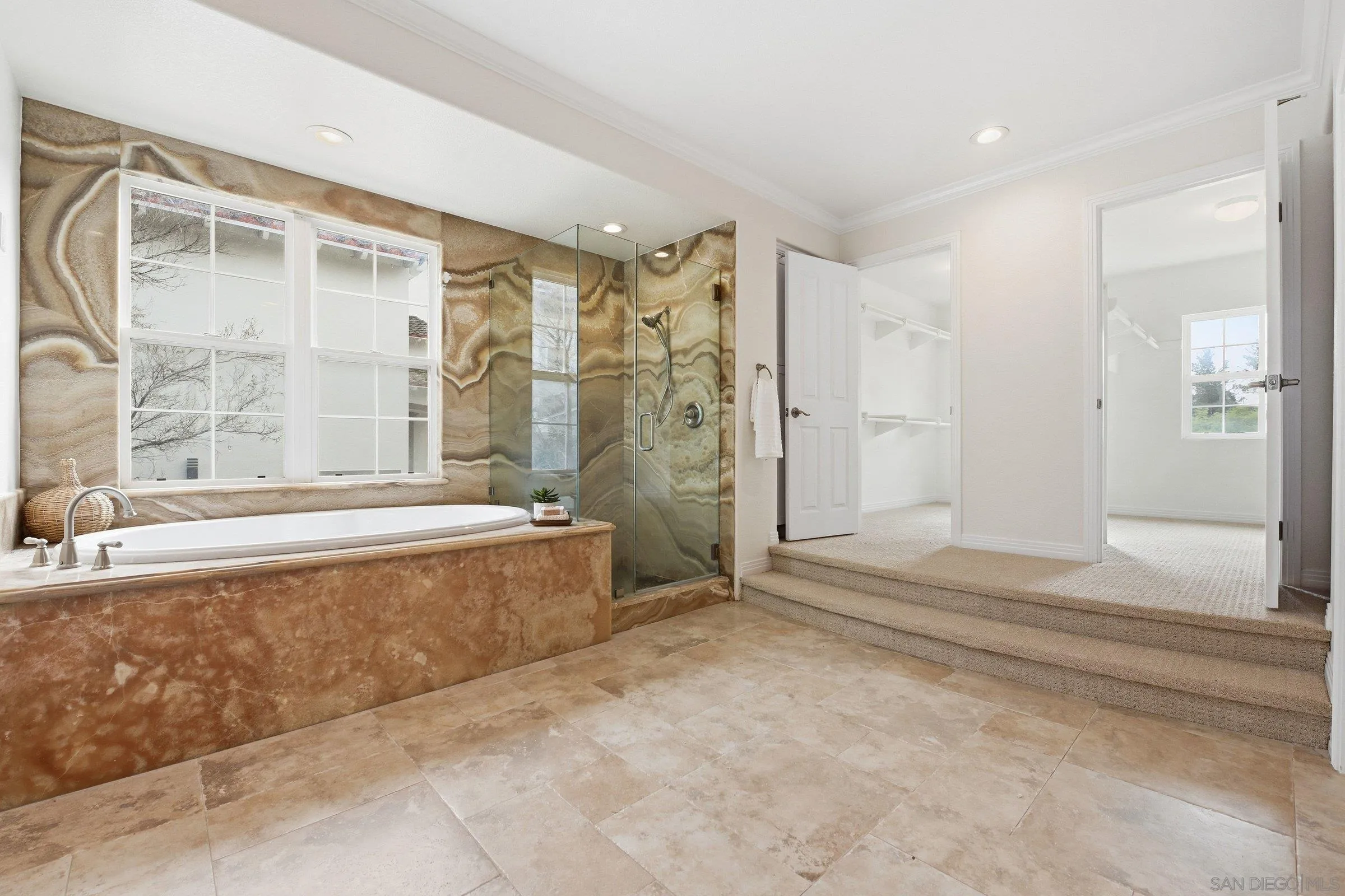 12632 Footman Lane Poway, CA 92064 - Photo 35 of 48 a spacious bathroom with a tub and shower