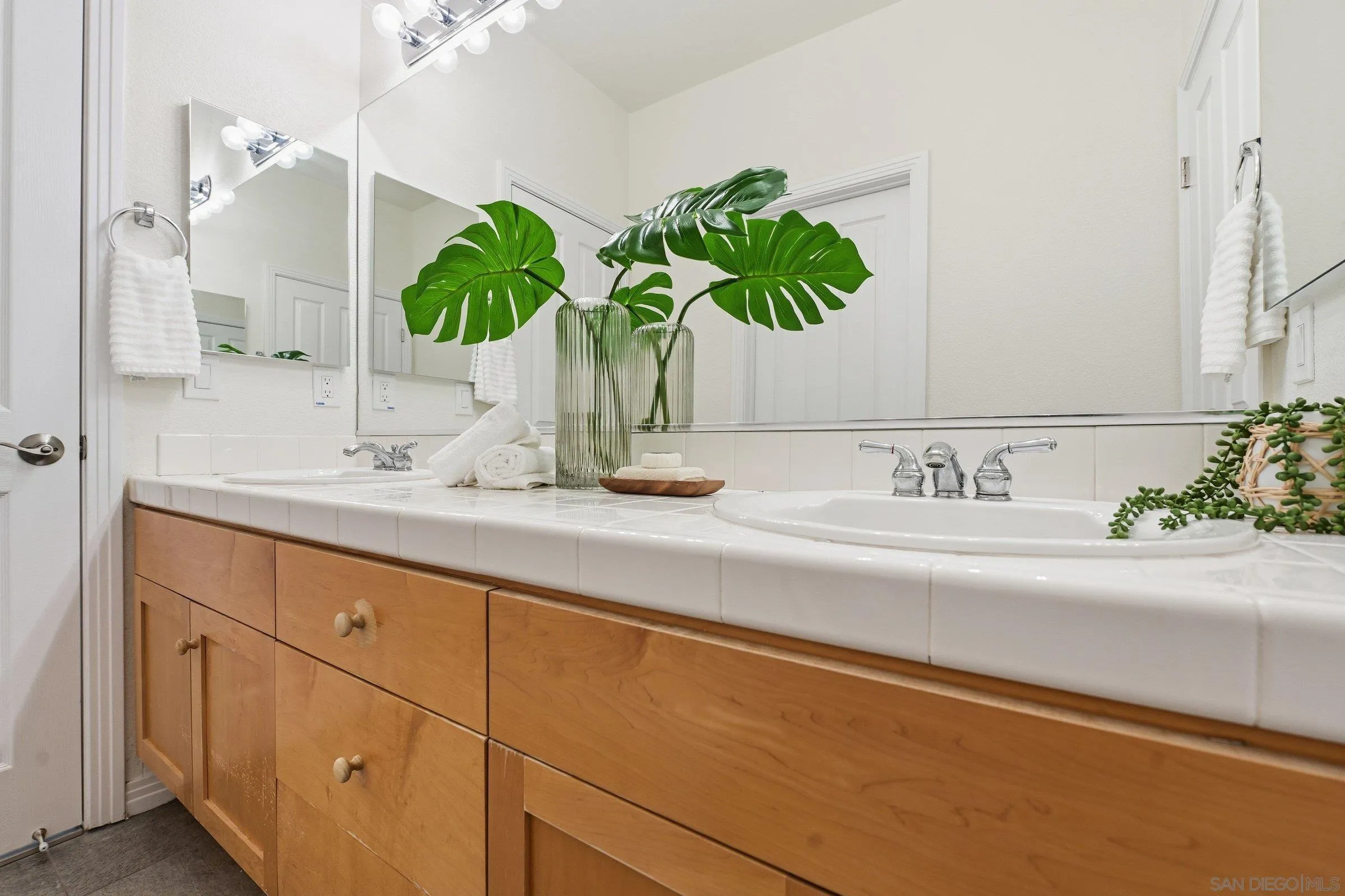 12632 Footman Lane Poway, CA 92064 - Photo 39 of 48 a bathroom with a sink and a mirror